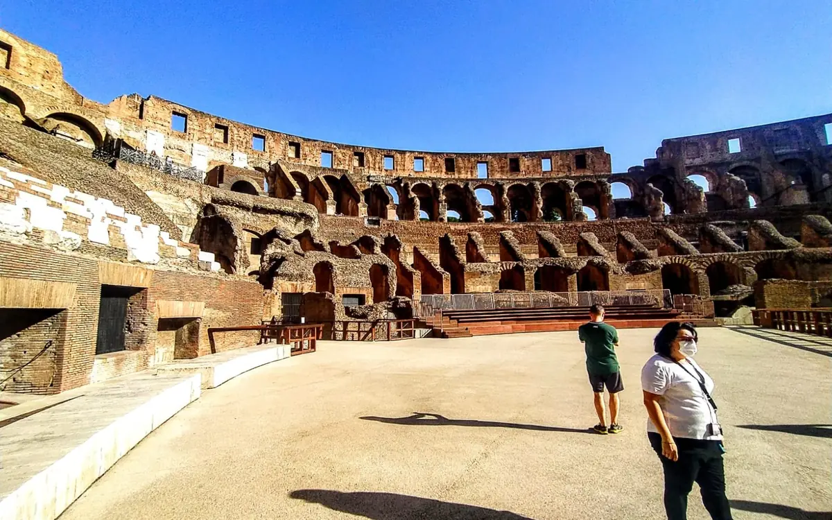 The interior of the Colosseum seen from the upper tiers in afternoon light